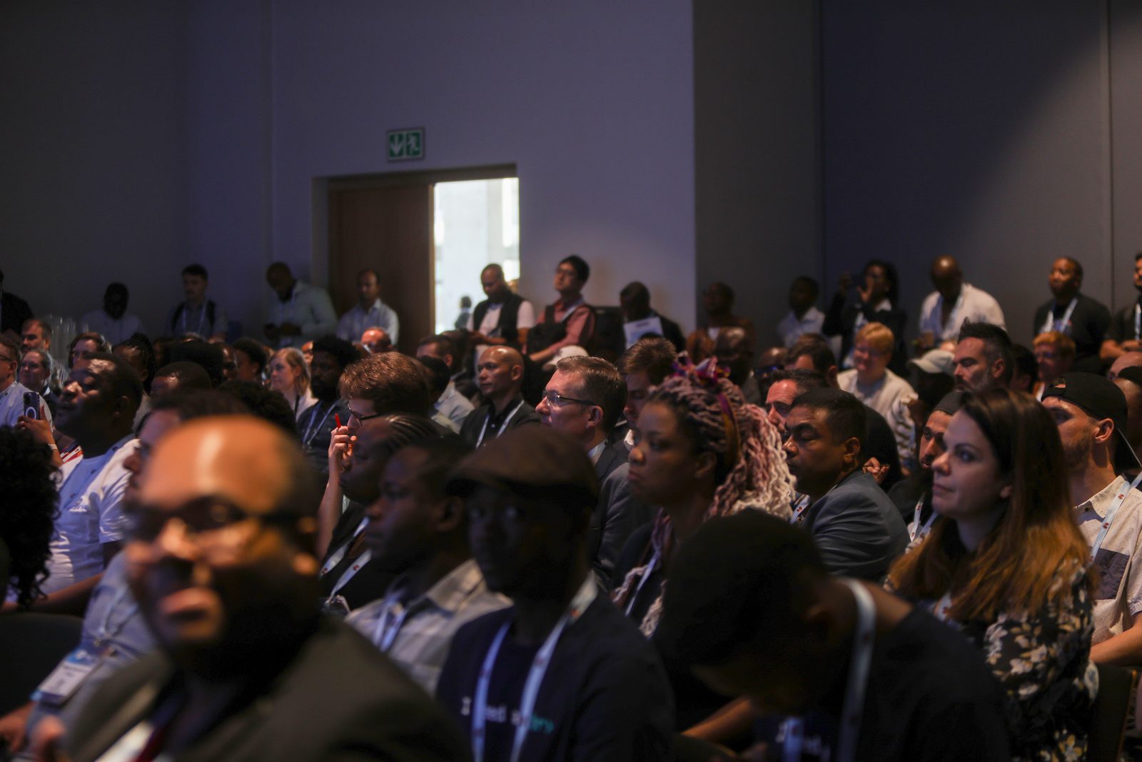 A packed conference audience
