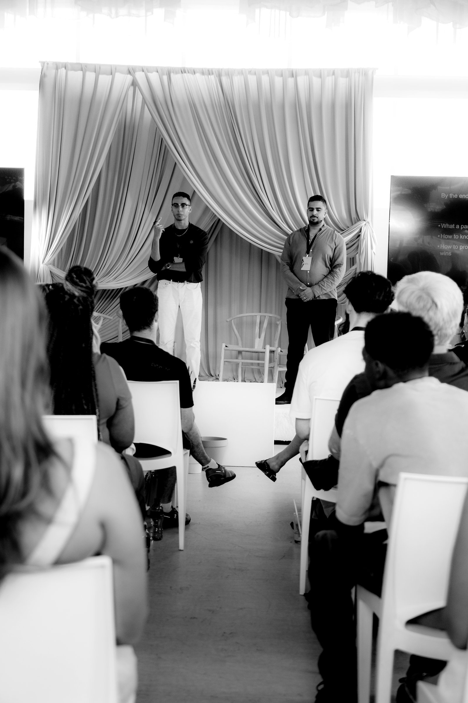 Akil Wade speaking at a live event